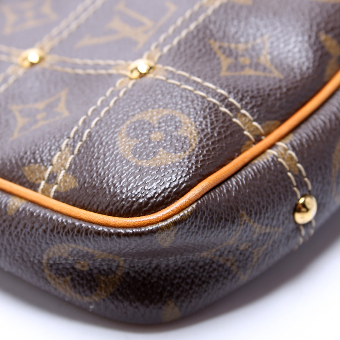 Riveting Pochette Accessories Monogram