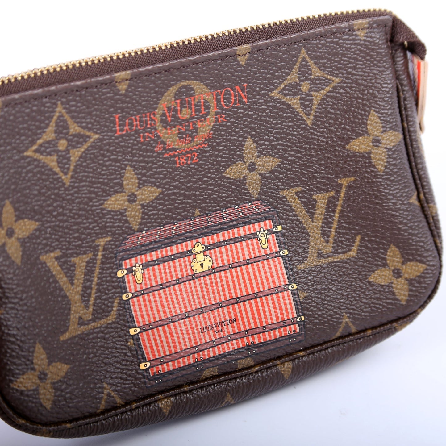 Pochette Accessories Mini Monogram Trunks