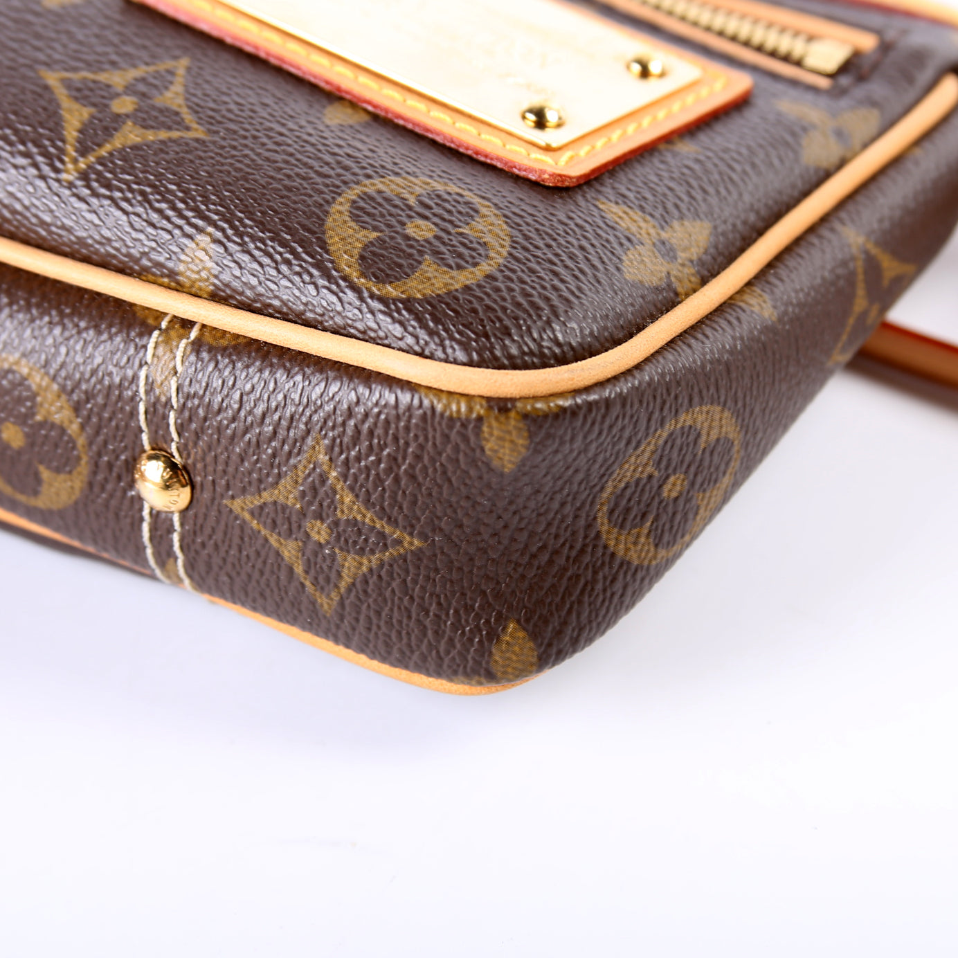 Riveting Pochette Accessories Monogram